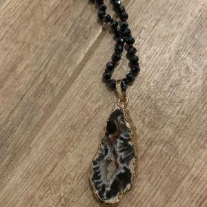 Elegant Black and Gold Pendant Necklace